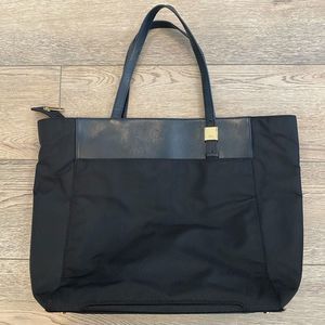 Tumi Tote in Black with Gold Accents - Versatile for Work or Travel, Gently Used